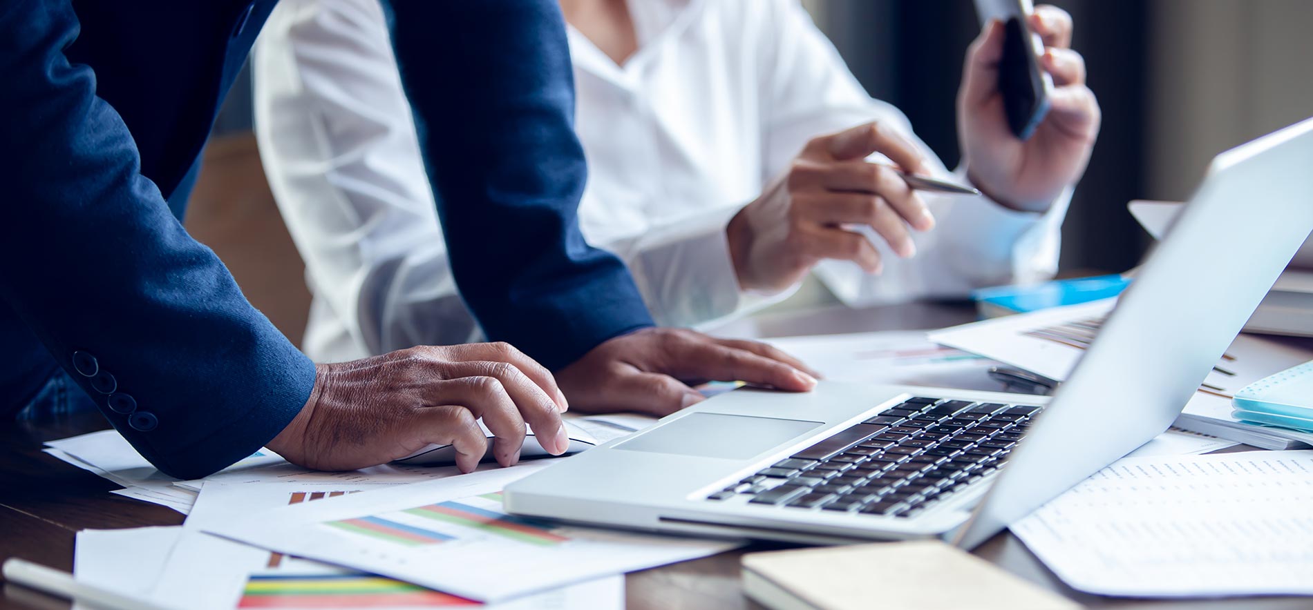 Business laptops and paperwork